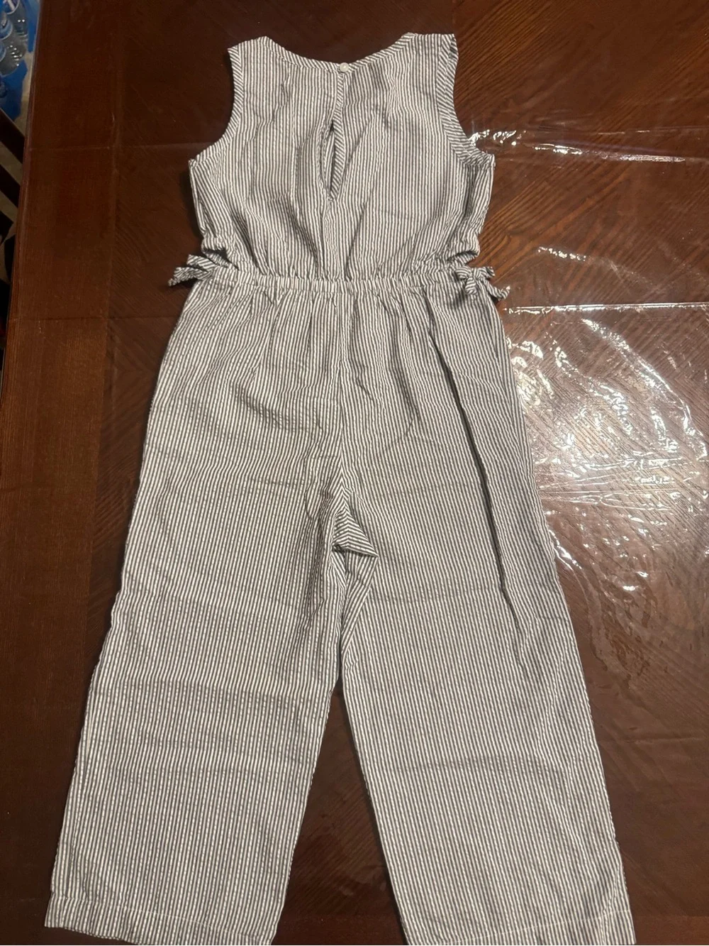 Lot of 2 Carter's Black Floral Smocked Romper and gray striped jumpsuit